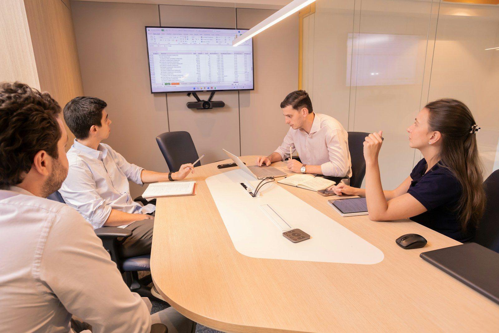 A management team in a boardroom meeting.
