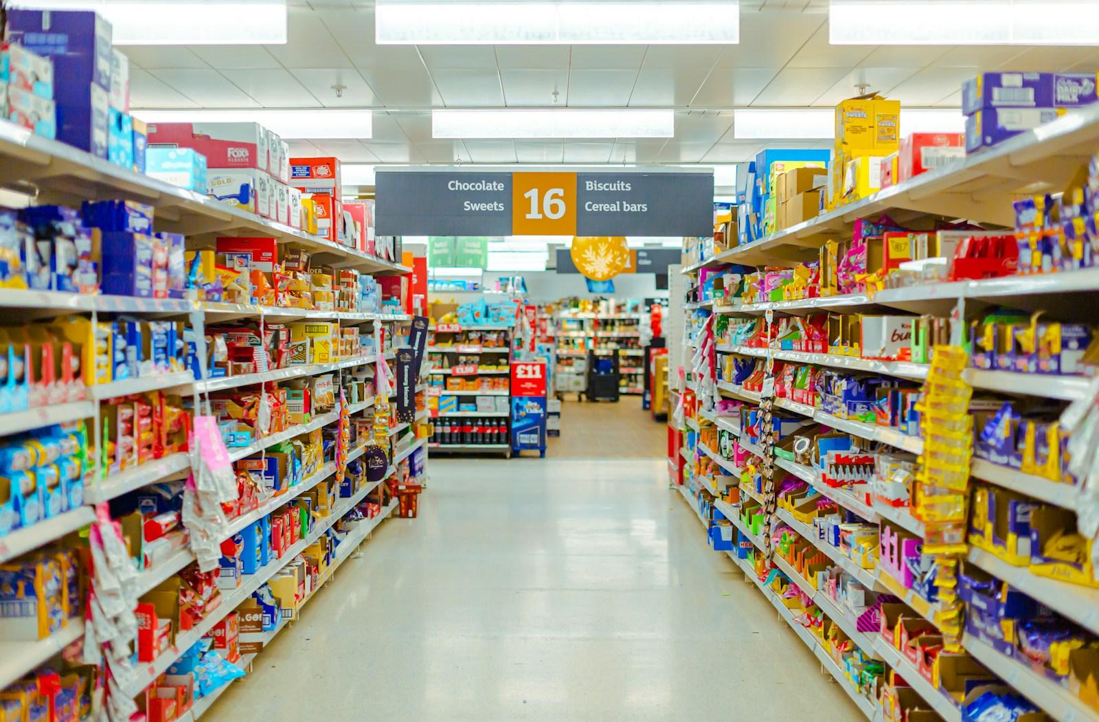 A stocked supermarket aisle